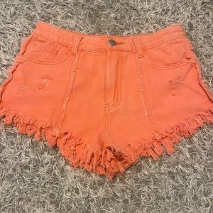 Distressed orange jean shorts size small